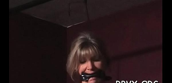  Older wench gets titillated while being strapped tight